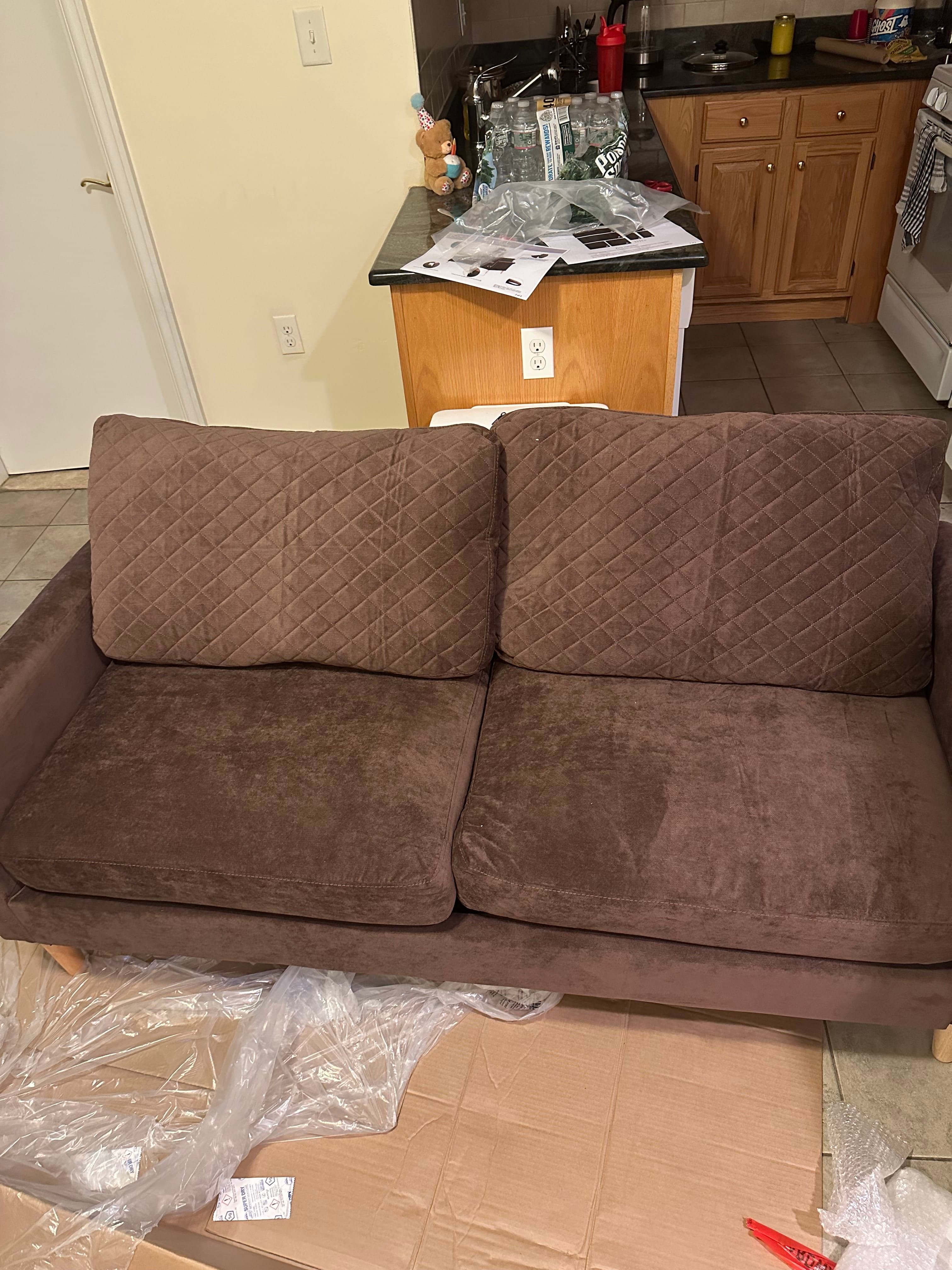 Brown loveseat sofa